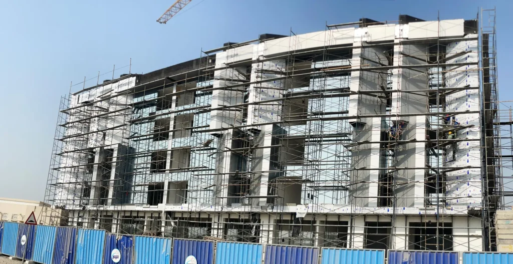 ACP cladding being installed on a commercial building facade